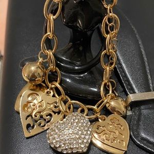 Gold tone charm bracelet